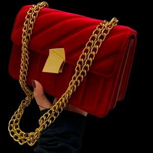 Red velvet and gold bag. New